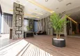 Kupić Apartament 1+1 w Alanya, dzielnica Mahmutlar — meble, widok na góry 50