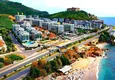 Kupić Apartament 2+1 na pierwszej linii w Alanyi, dzielnica Kargicak — meble, boczny widok na morze 1