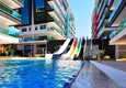 Kupić Apartament 2+1 na pierwszej linii w Alanyi, dzielnica Kargicak — meble, boczny widok na morze 16