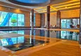 Kupić Apartament 2+1 na pierwszej linii w Alanyi, dzielnica Kargicak — meble, boczny widok na morze 37