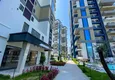 Kupić 1+1 umeblowane mieszkanie w Alanyi — kompleks hotelowy, dzielnica Mahmutlar 12 