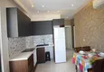 Dostępny zakup Tani apartament 1+1 w Mahmutlar - umeblowany i z widokiem na góry 7