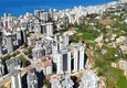 Kupić Nieruchomość na zezwolenie na pobyt w Mahmutlar - dwupoziomowy ogród 3+1 z prywatnym tarasem i dostępem do basenu 2 
