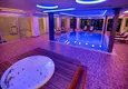 Kupić Apartament 1+1 w Tosmur, 76 m2 z meblami i widokiem na morze - nieruchomość na zezwolenie na pobyt w Alanyi  22 