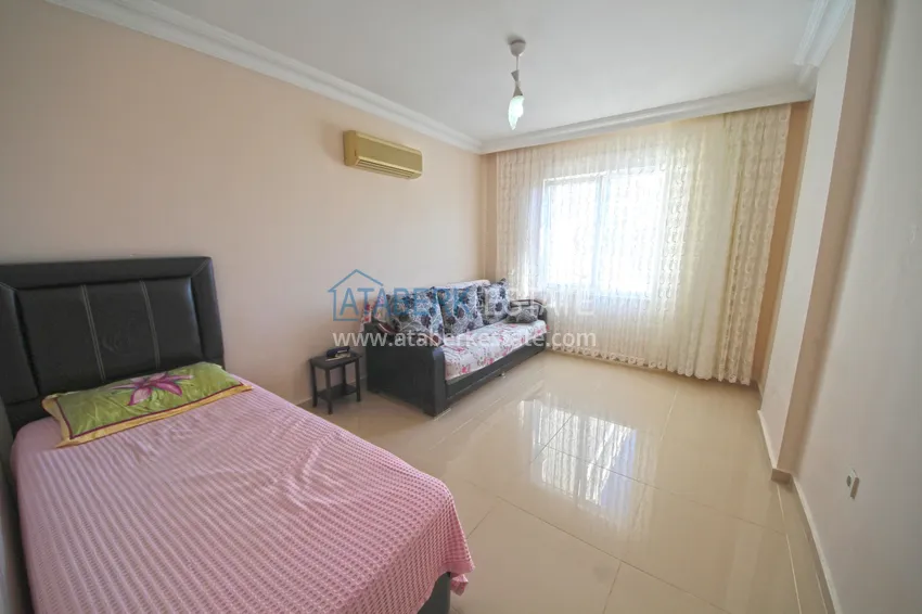 Kupuj Dwupoziomowy penthouse w Mahmutlarze z umeblowaną oddzielną kuchnią i widokiem na morze 13 