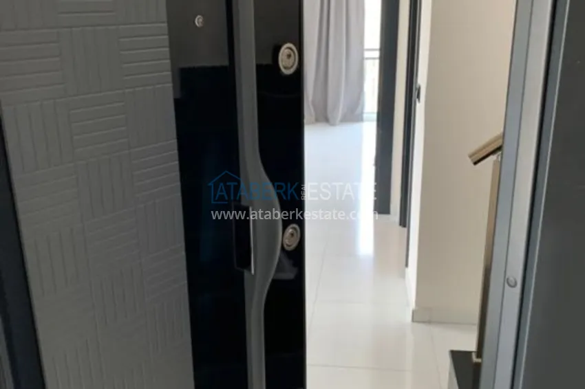 Kupuj Umeblowany dwupoziomowy penthouse w Mahmutlar z widokiem na morze i góry 1