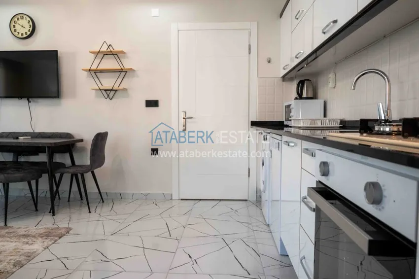 Kupuj Wynajem w najlepszej części Alanyi - apartament z dwiema sypialniami nad morzem w centrum miasta nr 18 28