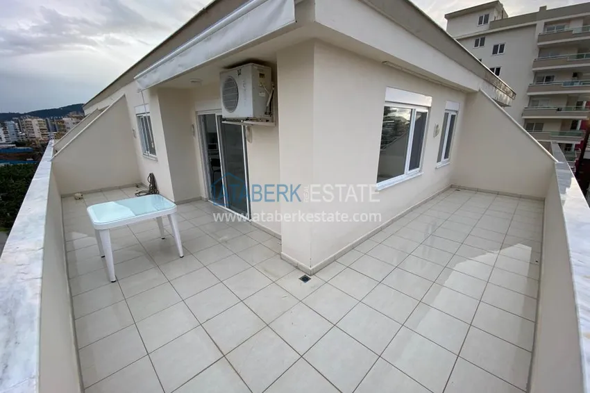 Kupuj Dwupoziomowy penthouse w Mahmutlarze z meblami w zadbanym kompleksie 16