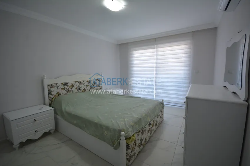 Kupuj Umeblowany penthouse w Mahmutlarze z widokiem na morze w młodym kompleksie 11 