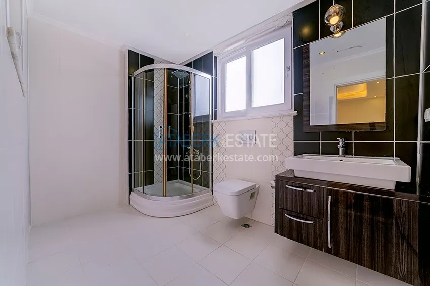 Kupuj Dwupoziomowy penthouse w Mahmutlarze z widokiem na morze i góry 13