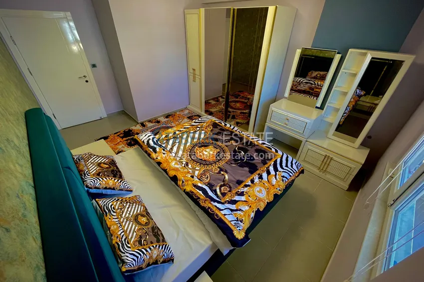 Kupuj  Umeblowane mieszkanie w dzielnicy Kestel z przeszklonym balkonem i widokiem na góry 14 