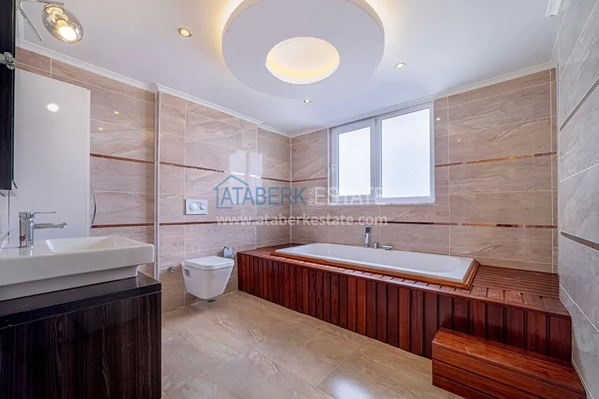 Kupuj Dwupoziomowy penthouse w Mahmutlarze z widokiem na morze i góry 14