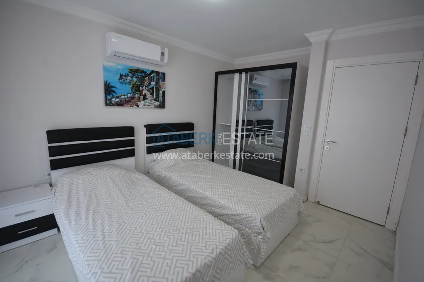 Kupuj Umeblowany penthouse w Mahmutlarze z widokiem na morze w młodym kompleksie 14 