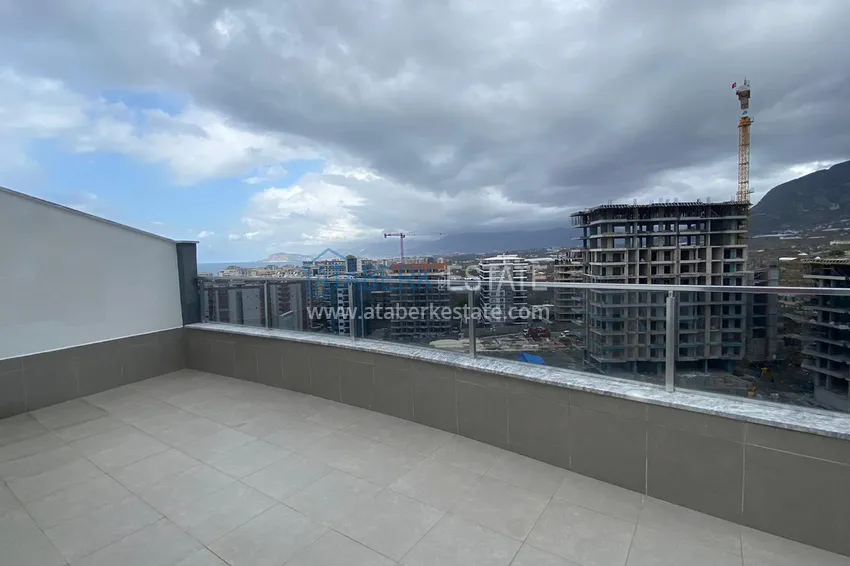 Kupuj Umeblowany dwupoziomowy penthouse w Mahmutlar z widokiem na góry, morze i historyczną fortecę 15