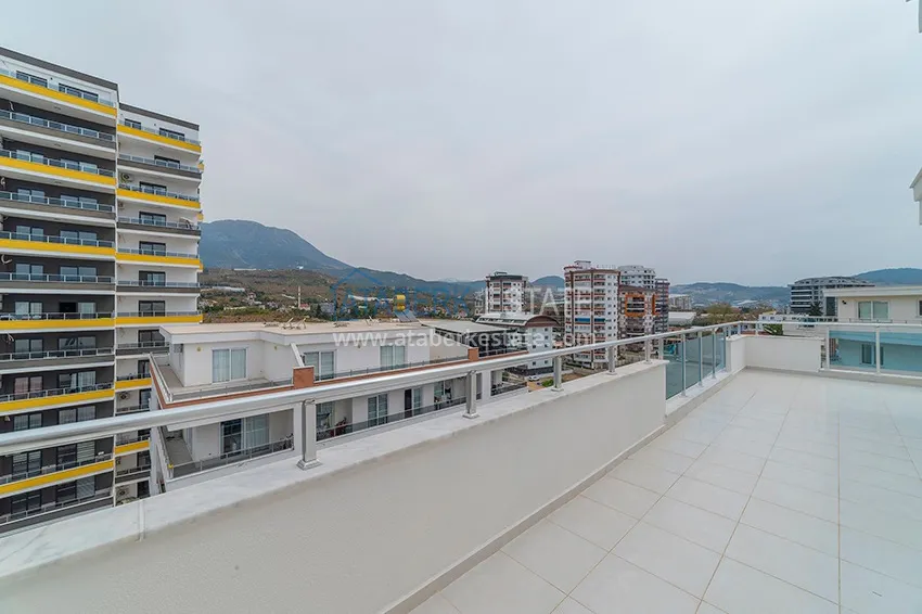 Kupuj Dwupoziomowy penthouse w Mahmutlarze z widokiem na morze i góry 21