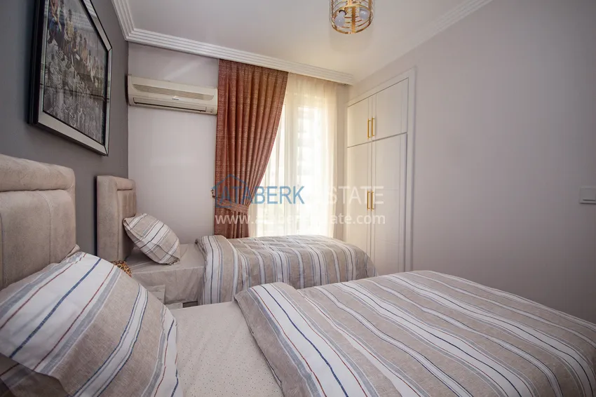 Kupuj  Apartament w Mahmutlarze z meblami i osobną kuchnią w komfortowym kompleksie 21 