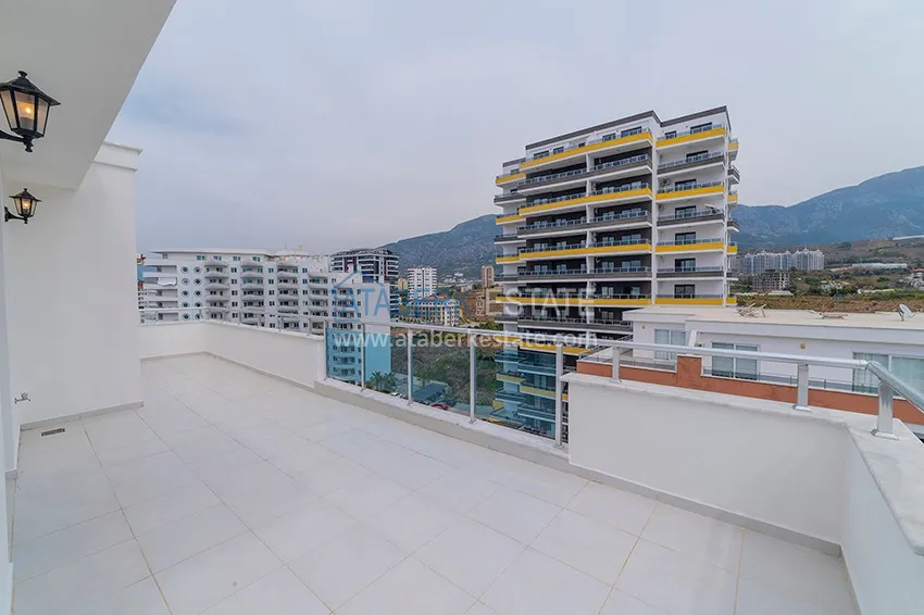 Kupuj Dwupoziomowy penthouse w Mahmutlarze z widokiem na morze i góry 24