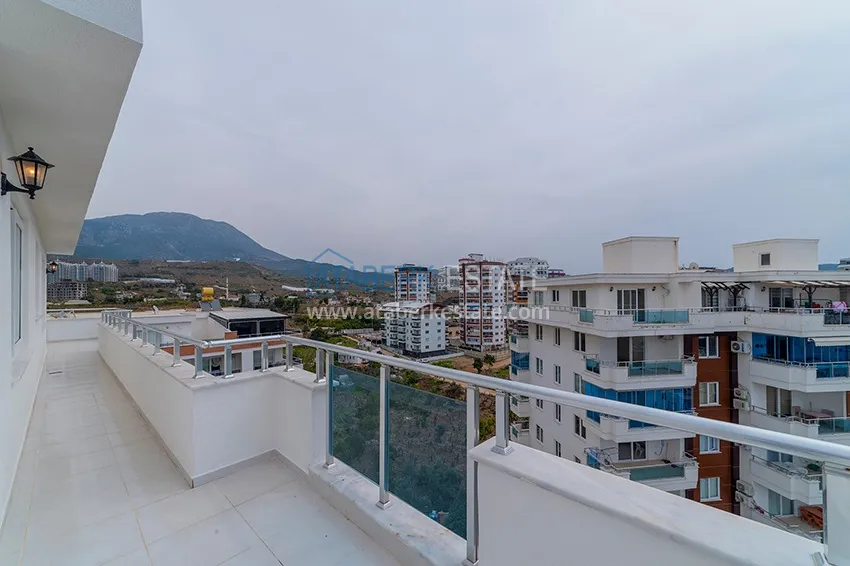 Kupuj Dwupoziomowy penthouse w Mahmutlarze z widokiem na morze i góry 28