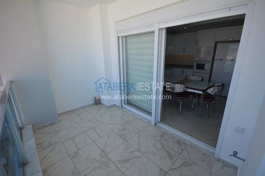 Kupuj Umeblowany penthouse w Mahmutlarze z widokiem na morze w młodym kompleksie 9 