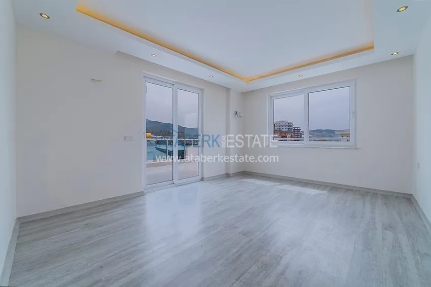 Kupuj Dwupoziomowy penthouse w Mahmutlarze z widokiem na morze i góry 9