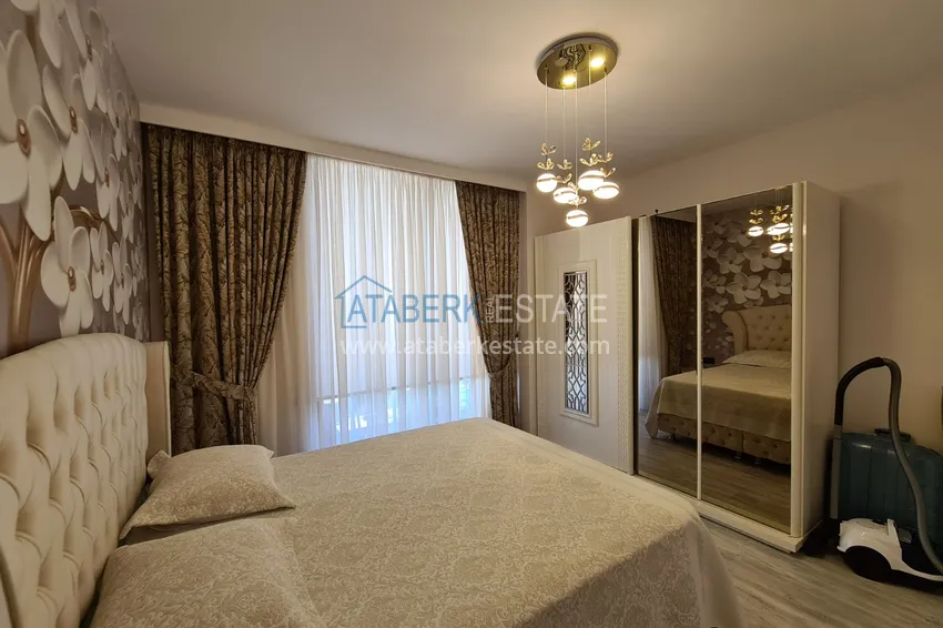 Kupuj  Umeblowany apartament w miejscowości Mahmutlar z oddzielną kuchnią i przeszklonym balkonem 16 