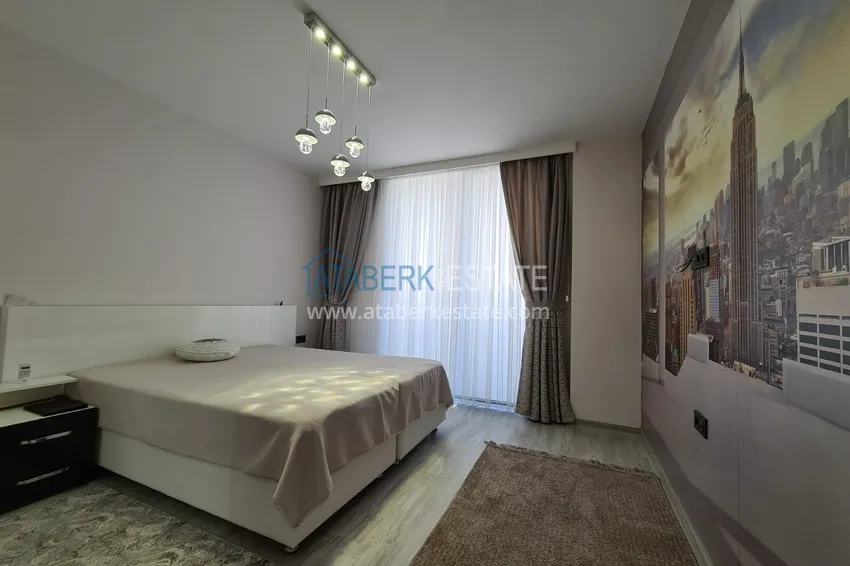 Kupuj  Umeblowany apartament w miejscowości Mahmutlar z oddzielną kuchnią i przeszklonym balkonem 11 