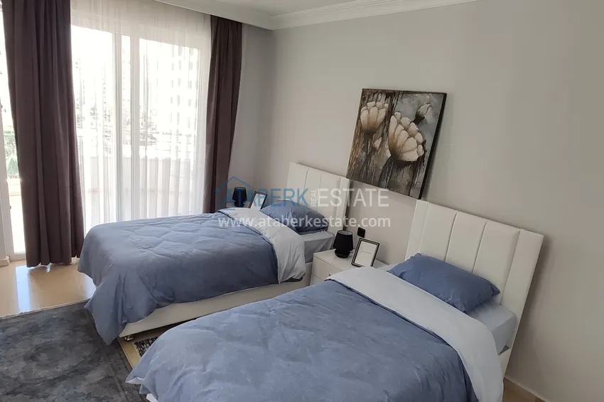 Kupuj  Dwupokojowe mieszkanie w Mahmutlar z meblami — drugi apartament przy plaży w przystępnej cenie 13 