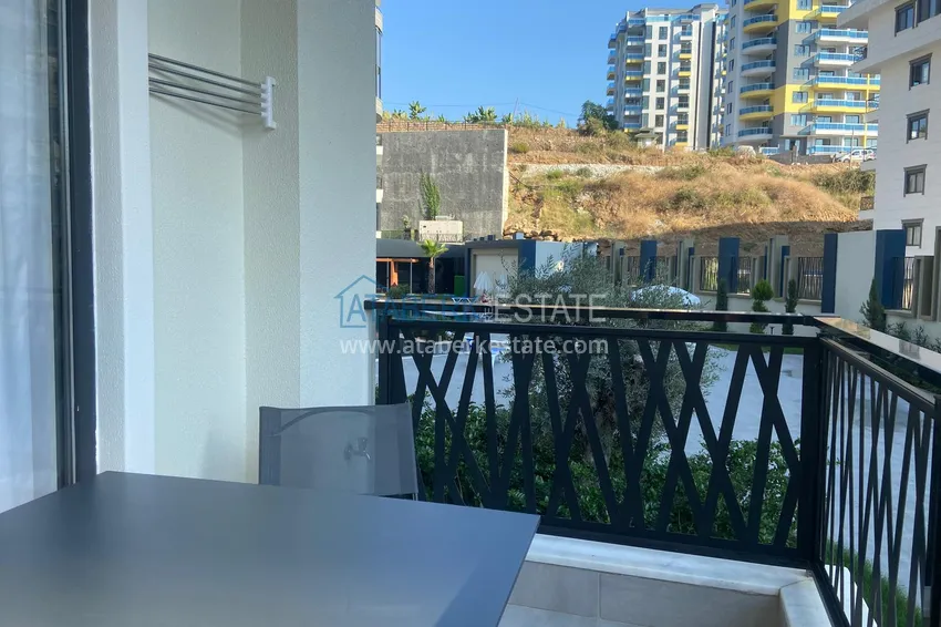 Kupuj  Jednopokojowe mieszkanie do wynajęcia krótkoterminowego w Mahmutlar — Alanya, w kompleksie hotelowym A3 9 