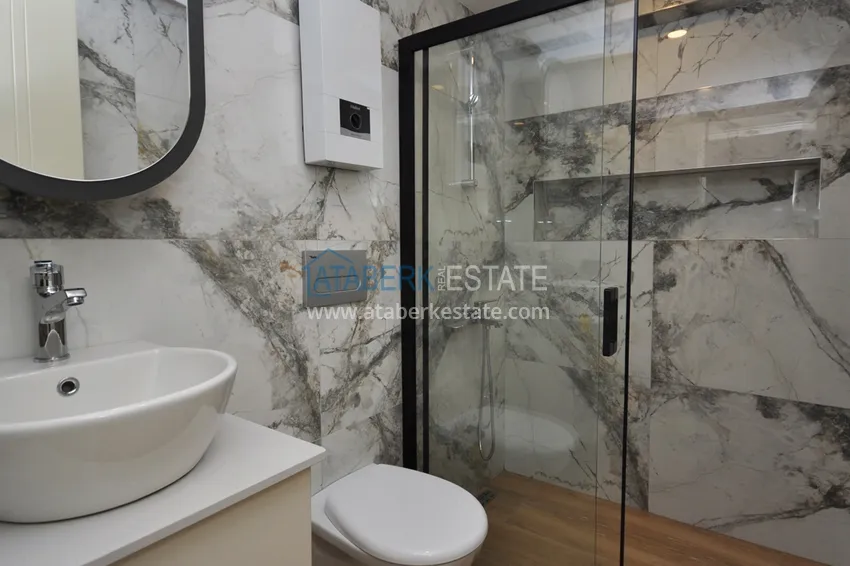 Kupuj  Apartament 1+1 w centrum Alanyi z pięknym wykończeniem - plaża Keykubat  12 
