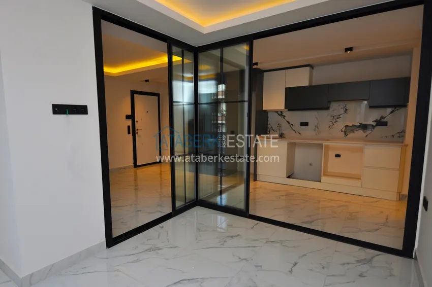 Kupuj  Apartament 1+1 w centrum Alanyi z pięknym wykończeniem - plaża Keykubat  1 