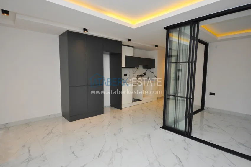 Kupuj  Apartament 1+1 w centrum Alanyi z pięknym wykończeniem - plaża Keykubat  3 