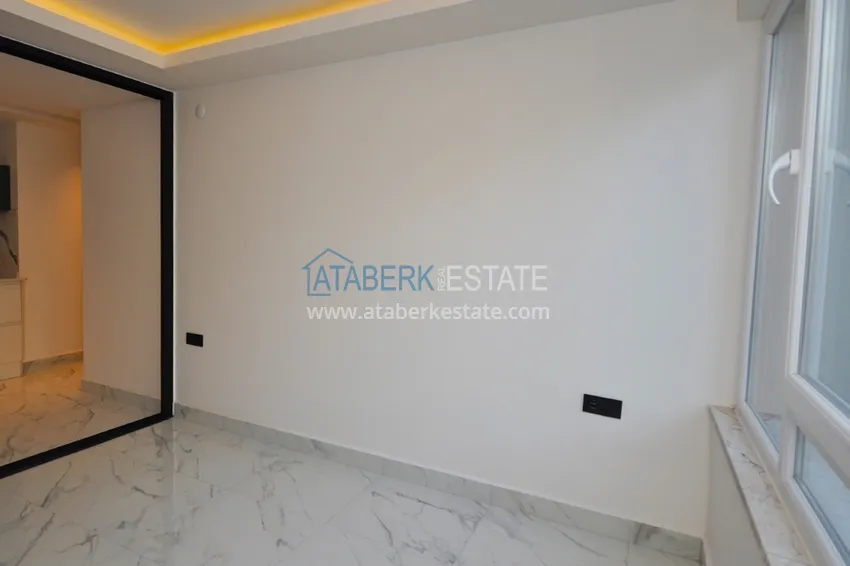 Kupuj  Apartament 1+1 w centrum Alanyi z pięknym wykończeniem - plaża Keykubat  4 