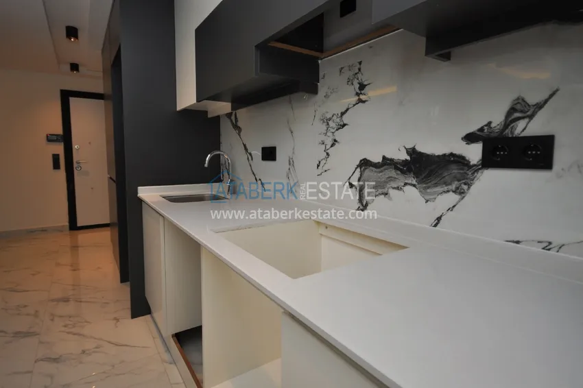 Kupuj  Apartament 1+1 w centrum Alanyi z pięknym wykończeniem - plaża Keykubat  5 