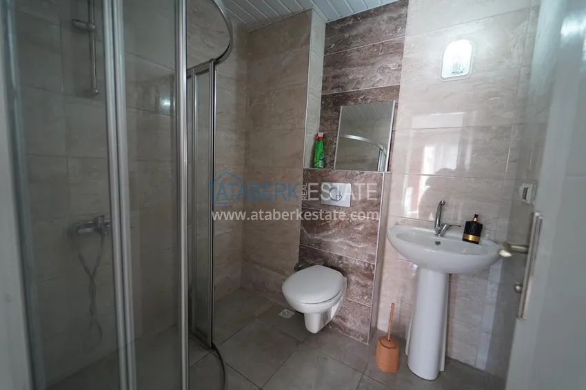 Kupuj  Umeblowany apartament w Mahmutlar z widokiem na góry i częściowym widokiem na morze 12 