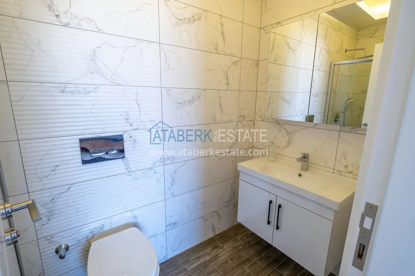 Kupuj  Dwupoziomowy penthouse 2+1 z meblami w obszarze otwartym na zezwolenia na pobyt, centrum Alanya 12 