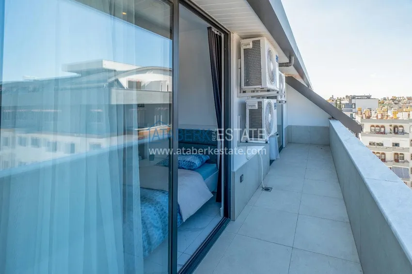 Kupuj  Dwupoziomowy penthouse 2+1 z meblami w obszarze otwartym na zezwolenia na pobyt, centrum Alanya 14 
