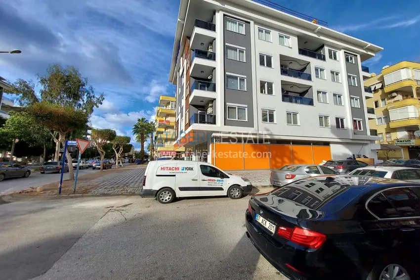 2-pokojowe mieszkanie do wynajęcia w centrum Alanyi w nowoczesnym miejskim budynku mieszkalnym nr 5 1 