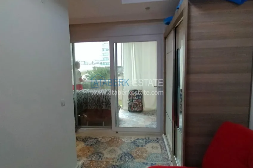 Kupuj  Umeblowany apartament z jedną sypialnią z bonusem od właściciela w kompleksie z prywatną plażą, dzielnica Avsallar — Alanya 3 