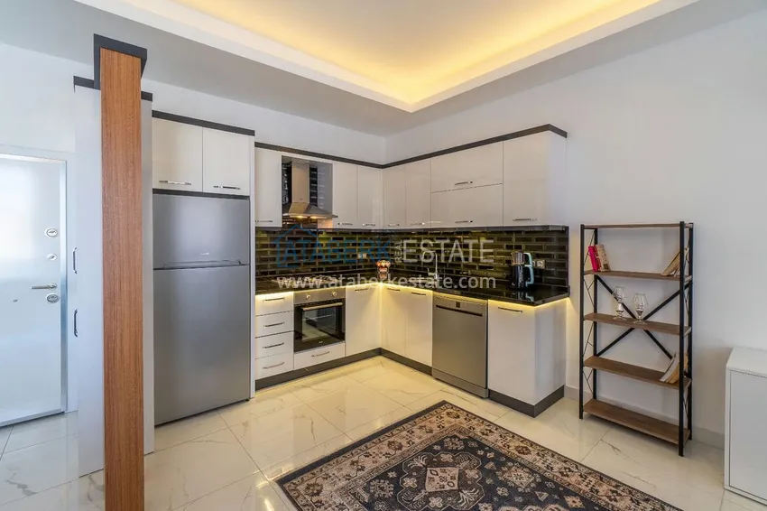 Kupuj  Dwupoziomowy penthouse 2+1 z meblami w obszarze otwartym na zezwolenia na pobyt, centrum Alanya 4 