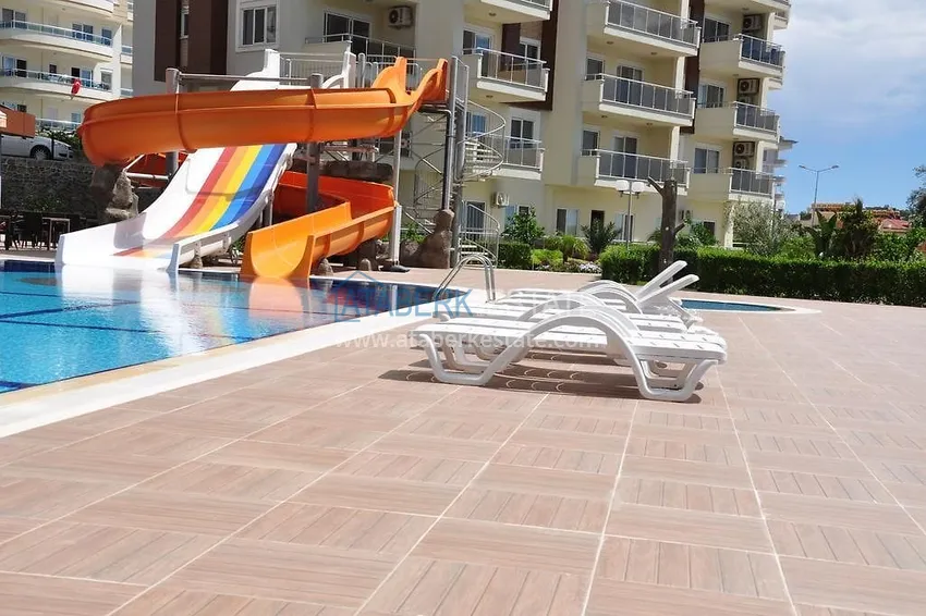 Umeblowany apartament z jedną sypialnią z bonusem od właściciela w kompleksie z prywatną plażą, dzielnica Avsallar — Alanya 8 