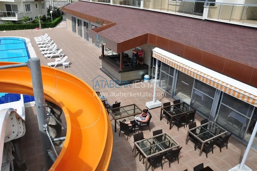 Umeblowany apartament z jedną sypialnią z bonusem od właściciela w kompleksie z prywatną plażą, dzielnica Avsallar — Alanya 9 