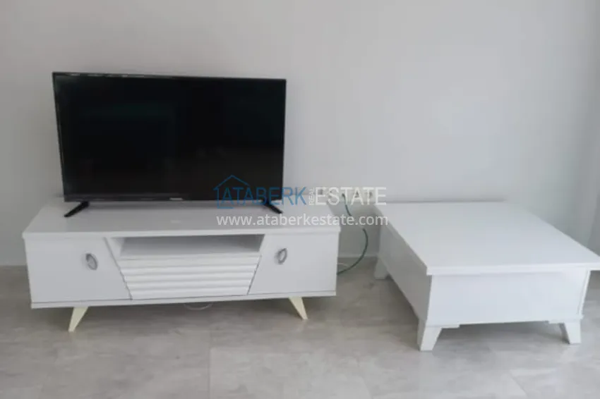 Kupuj  Pilna sprzedaż! 1+1 umeblowane mieszkanie w nowoczesnym kompleksie, dzielnica Mahmutlar — Alanya  12 