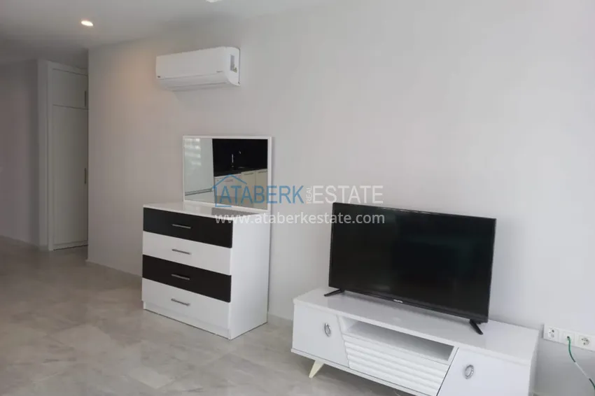Kupuj  Pilna sprzedaż! 1+1 umeblowane mieszkanie w nowoczesnym kompleksie, dzielnica Mahmutlar — Alanya  11 