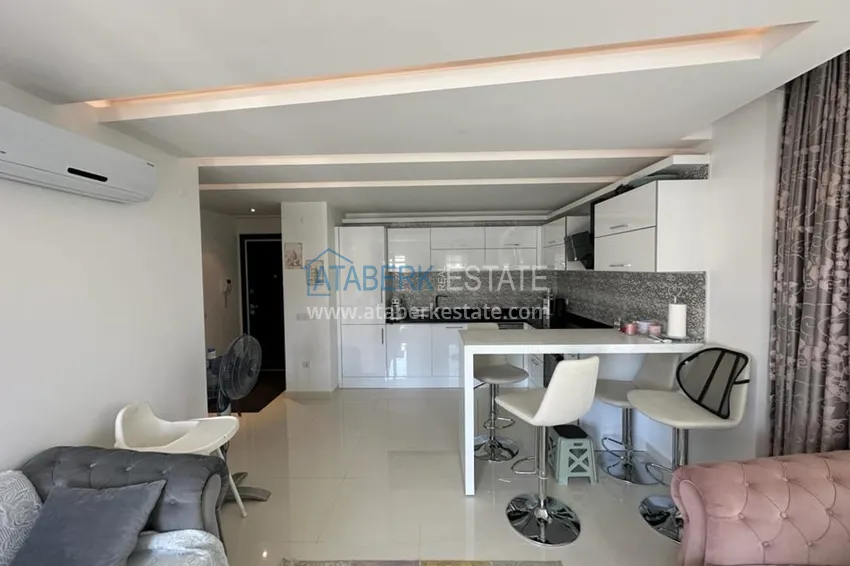 Kupuj  Penthouse 1+1 do wynajęcia w centrum Alanyi w ekskluzywnym kompleksie mieszkalnym  4 