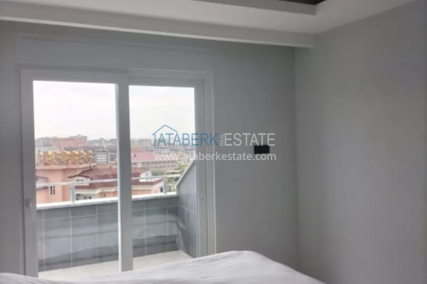 Kupuj  Dwupoziomowy penthouse 2+1 częściowo umeblowany z widokiem na morze, dzielnica Oba - Alanya. Nadaje się do zezwolenia na pobyt! 13 