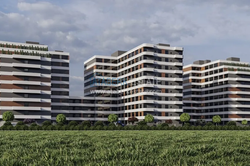 Nowy, komfortowy kompleks mieszkaniowy w budowie w dzielnicy Tomuk-Mersin 1