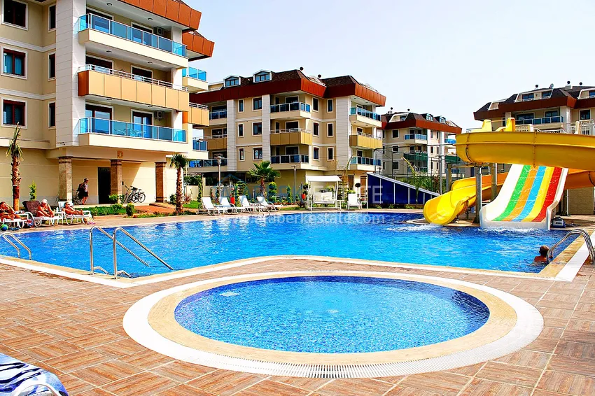 Umeblowany apartament 2+1 z przeszklonym balkonem w prestiżowym kompleksie - Oba, Alanya 1 