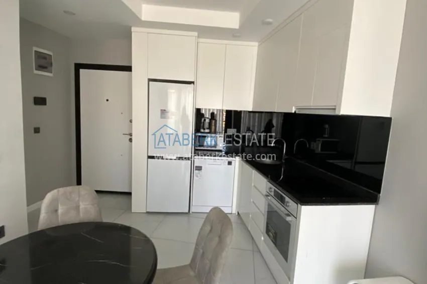 Kupuj  Jednopokojowy apartament 300 metrów od morza — Alanya, dzielnica Tosmur nr 18 1 