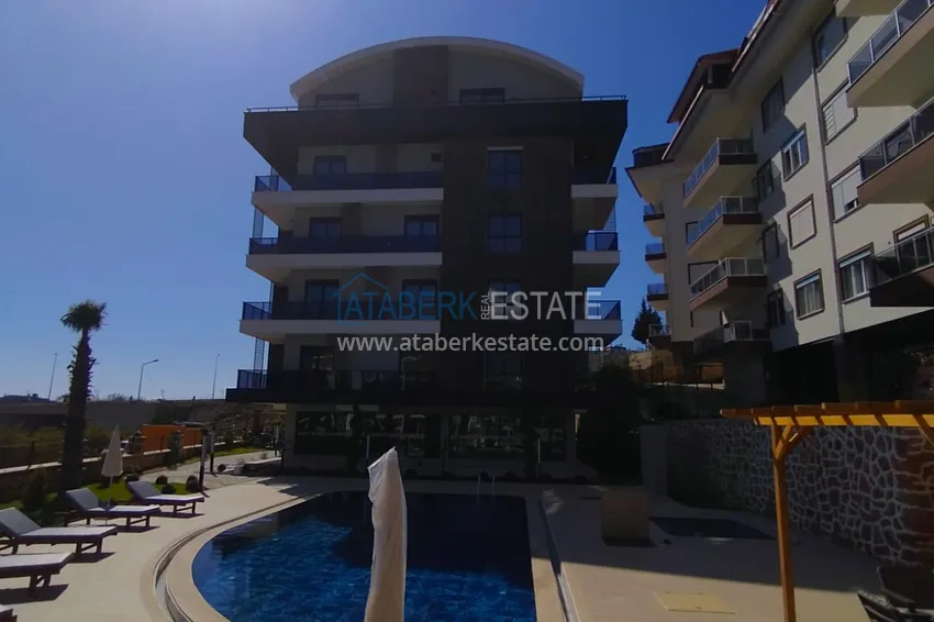 Apartament 1+1 z meblami i widokiem na góry w nowoczesnym kompleksie butikowym, dzielnica Oba — Alanya 2 