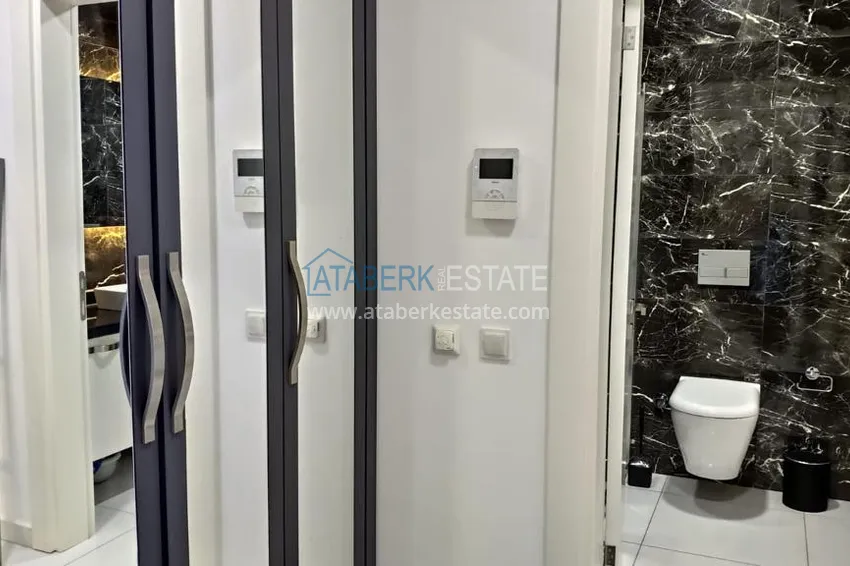 Kupuj  Kompaktowy penthouse 1+1 do wynajęcia w Kargicak z bezpośrednim widokiem na morze i góry C12 12 